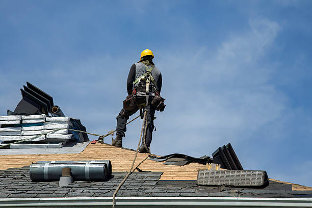 Professional Roofing technician working in Swan, IA